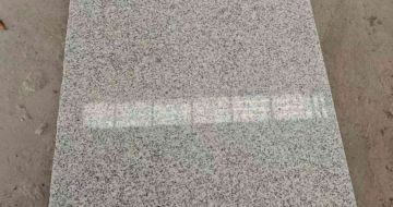 黄石芝麻白光面毛板